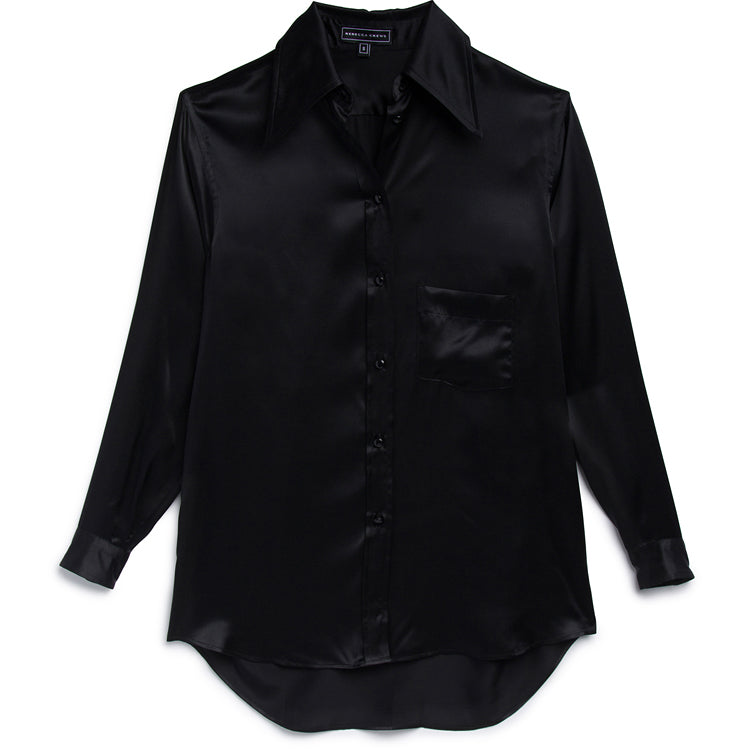 Indulge in the luxury of our ANNA MAY BLOUSE crafted from 100% Silk Charmeuse. The wide collar adds sophistication while the button down design exudes elegance. Elevate your wardrobe with this timeless piece, perfect for any occasion.